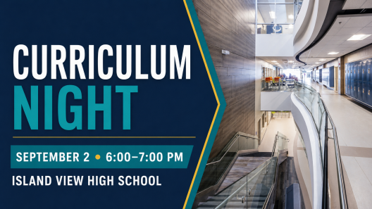 Island View High School interior featuring its curved staircase, glass railing and blue lockers. Curriculum Night is September 2 from 6:00 to 7:00 p.m.